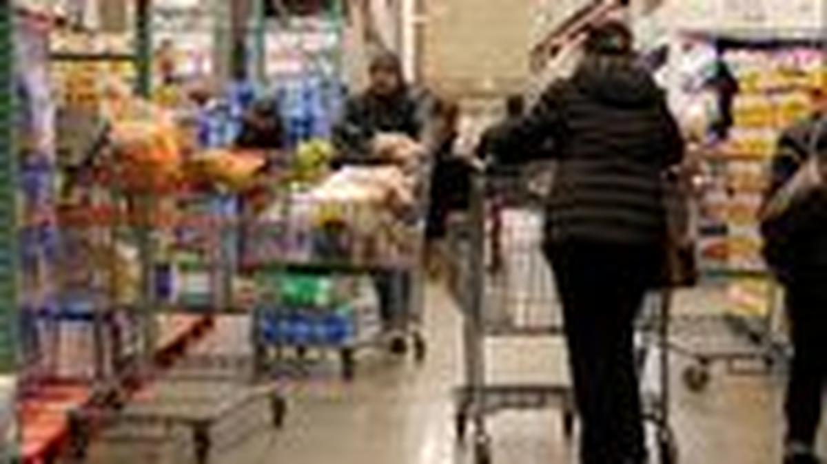 People shop at a Costco store in the Staten Island borough of New York City, U.S., January 16, 2026.  REUTERS/Brendan McDermid