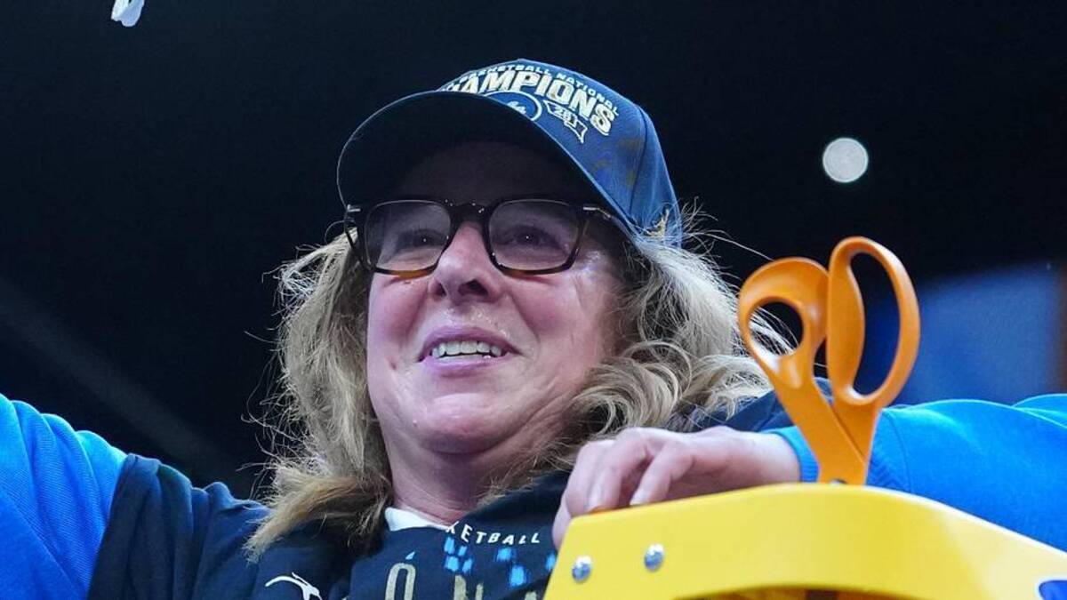  Apr 5, 2026; Phoenix, AZ, USA; UCLA Bruins head coach Cori Close cuts down the net after defeating the South Carolina Gamecocks during the National Championship game of the women's 2026 NCAA Tournament at Mortgage Matchup Center. Mandatory Credit: Kirby Lee-Imagn Images | Kirby Lee-Imagn Images 