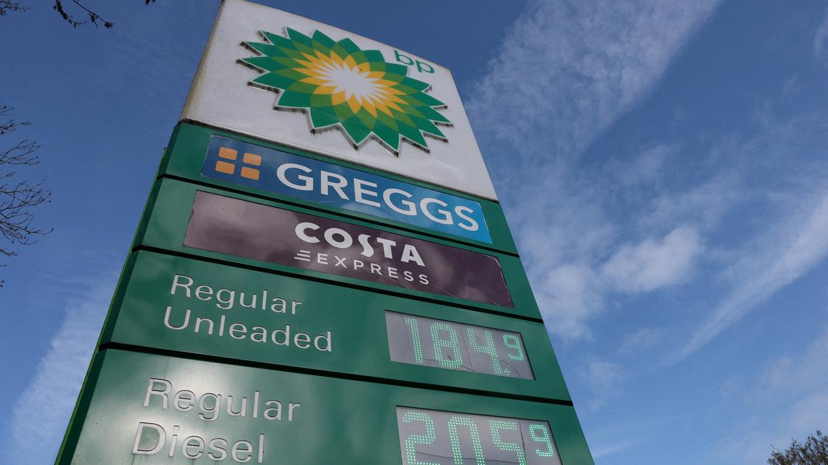 FILE PHOTO: Petrol and diesel prices in UK sterling currency per litre are displayed at a motorway services petrol station near Leigh Delamere, in Britain, April 16, 2026. REUTERS/Toby Melville/File Photo