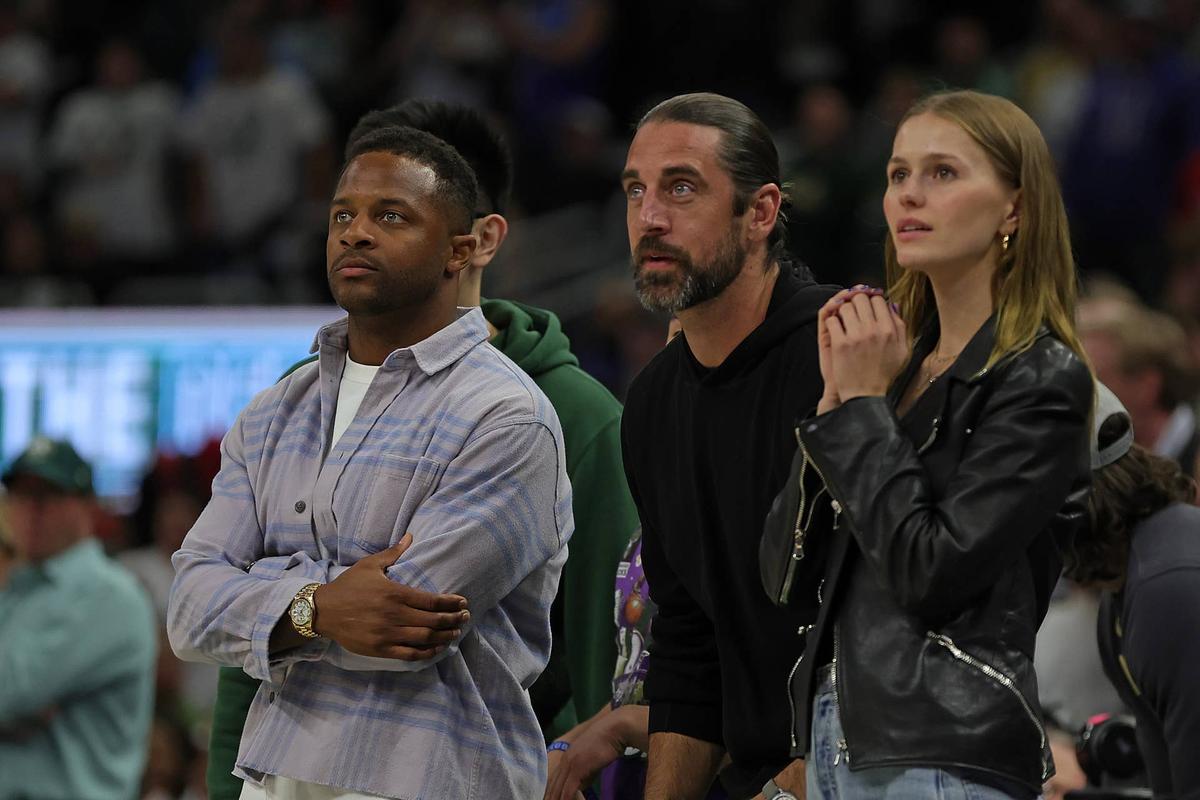  MILWAUKEE, WISCONSIN - APRIL 20: (L-R) Randall Cobb, Aaron Rodgers and Mallory Edens watch Game Two of the Eastern Conference First Round Playoffs between the Milwaukee Bucks and the Chicago Bulls at Fiserv Forum on April 20, 2022 in Milwaukee, Wisconsin. (Photo by Stacy Revere/Getty Images) 