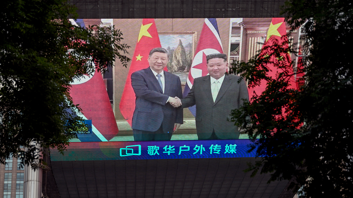 Xi pledges deeper ties with Kim while avoiding nuclear issue 