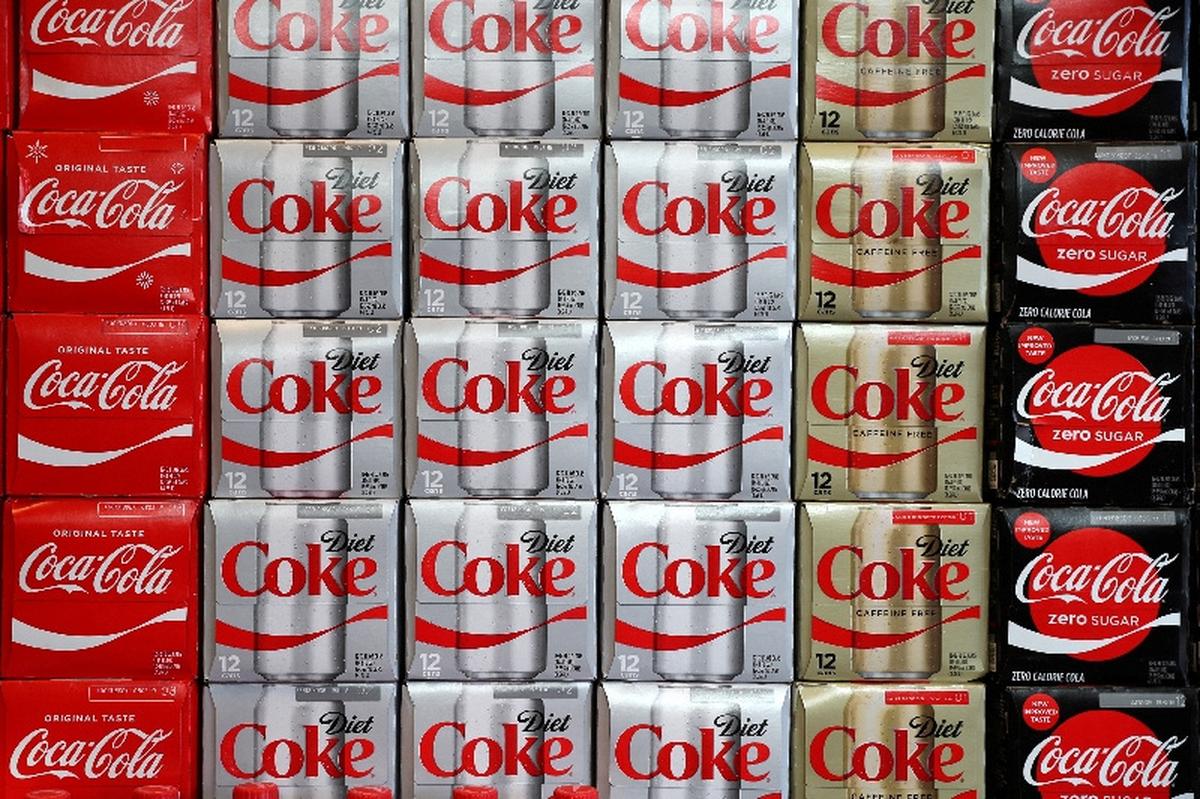 FILE PHOTO: Boxes of Coca-Cola are seen at a grocery store in Los Angeles, California U.S. November 21, 2017. REUTERS/Lucy Nicholson/File Photo