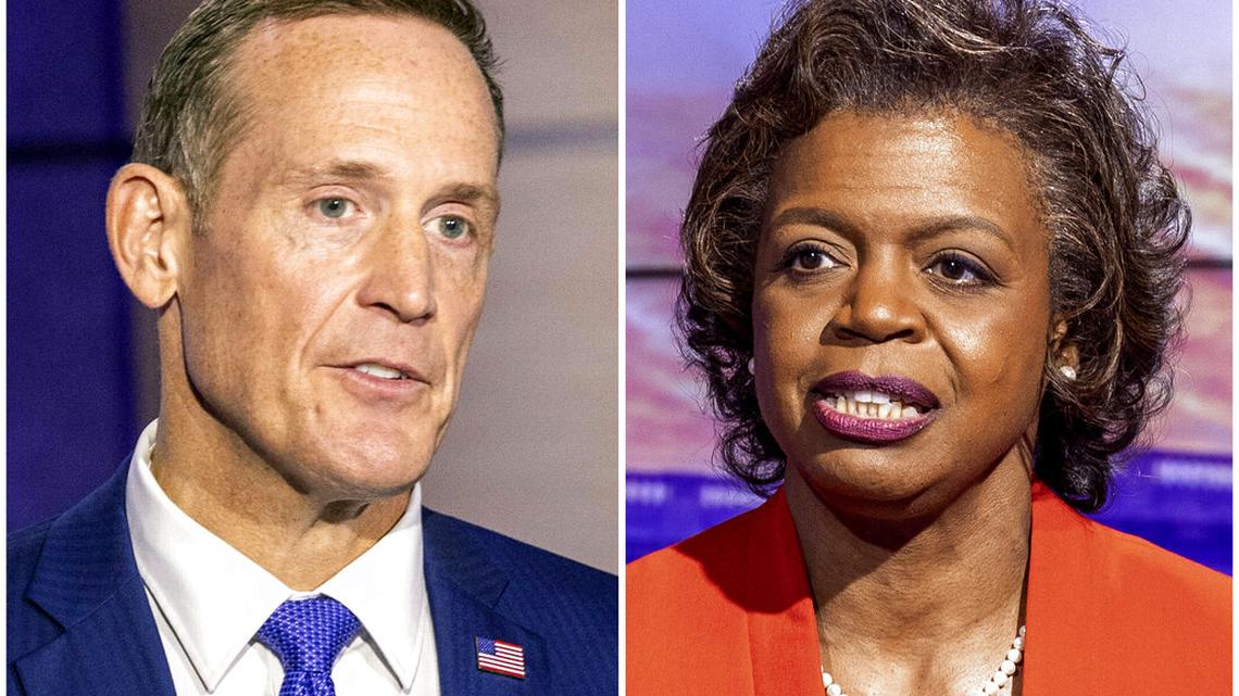 This combination of photos shows North Carolina Republican Senate candidate Rep. Ted Budd, R-N.C., left, and Democratic candidate Cheri Beasley, right, during a televised debate on Oct. 7, 2022, at Spectrum News 1 studio in Raleigh, N.C. (Travis Long/The News & Observer via AP, Pool)