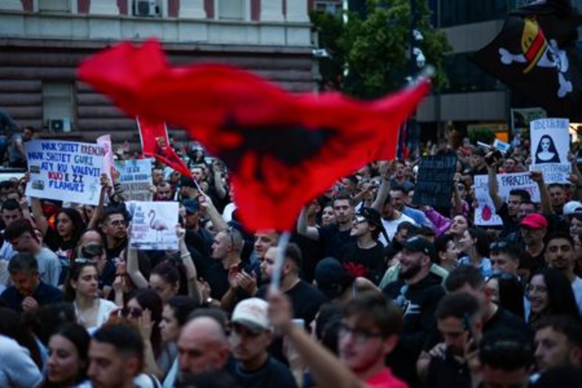 Protesters hold banners during a protest against a luxury resort development planned by a company linked with Donald Trump's son-in-law, Jared Kushner, on an environmentally sensitive part of the Adriatic coast, in Tirana, Albania, June 4, 2026. REUTERS/Florion Goga