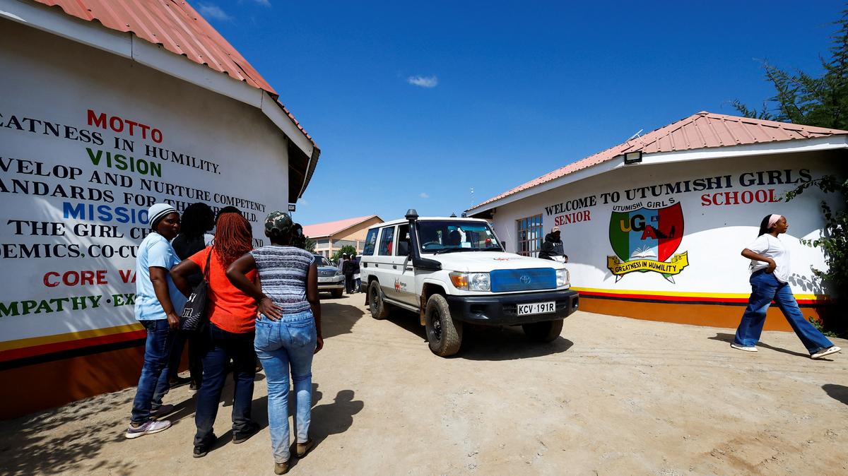 A Kenya Red Cross ambulance leaves Utumishi Girls' Academy Senior School following an overnight fire in a dormitory at the facility in Gilgil, Nakuru county, Kenya May 28, 2026. REUTERS/Thomas Mukoya