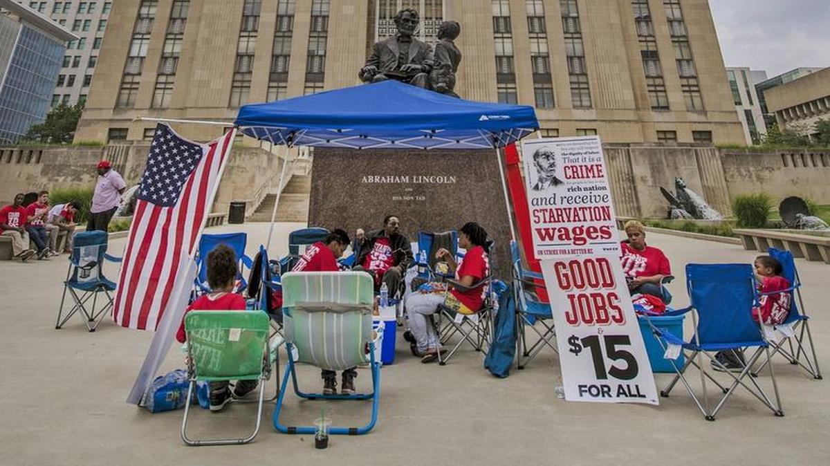 
In early July, people participated in a “Fast for $15” event on the south lawn of City Hall in Kansas City.
