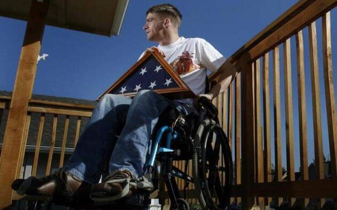 Seen in 2007 when he lived in Kansas City, Tomas Young brought national attention to problems of the nation’s injured veterans. He died Monday in Seattle at age 34.