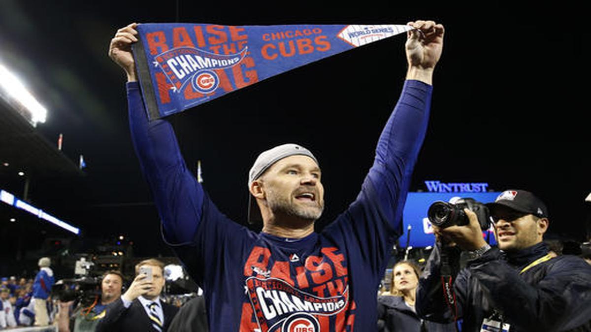 David Ross celebra tras la victoria de los Cachorros ante los Dodgers en el sexto juego de la Serie de Campeonato de la Liga Nacional, el 22 de octubre del 2006.