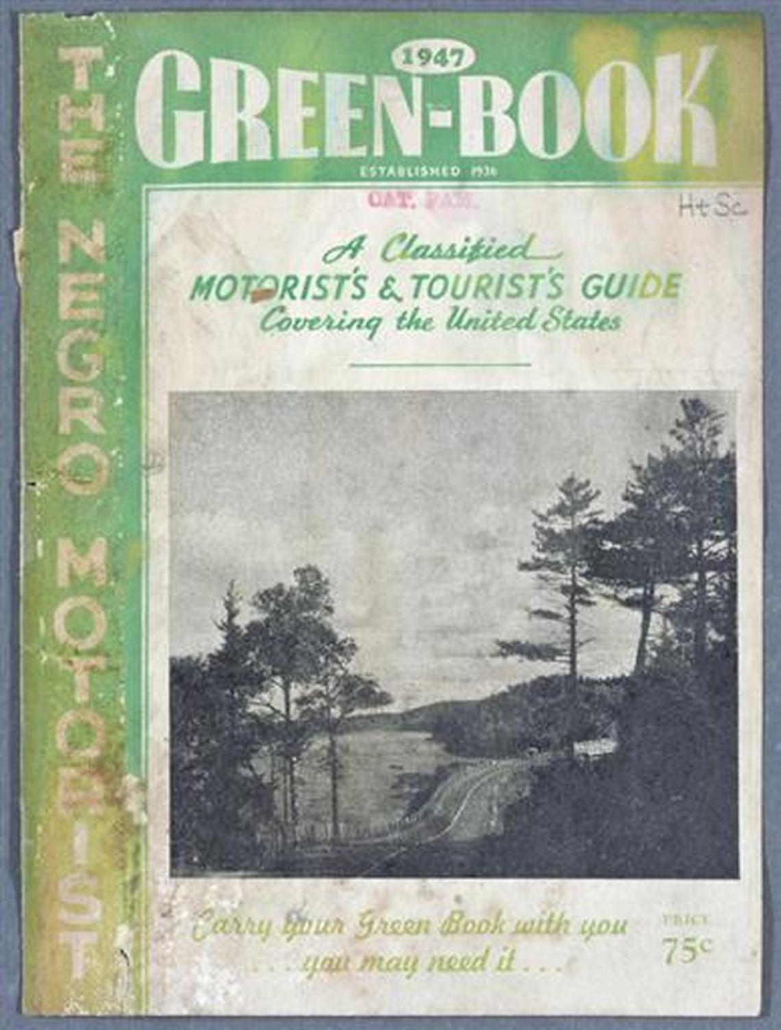 This updated photo courtesy of The New York Public Library shows a copy of The Travelers’ Green Book from 1947. Black travelers for decades needed a guide known as the Green Book to help located the few motels and restaurants that would serve them.