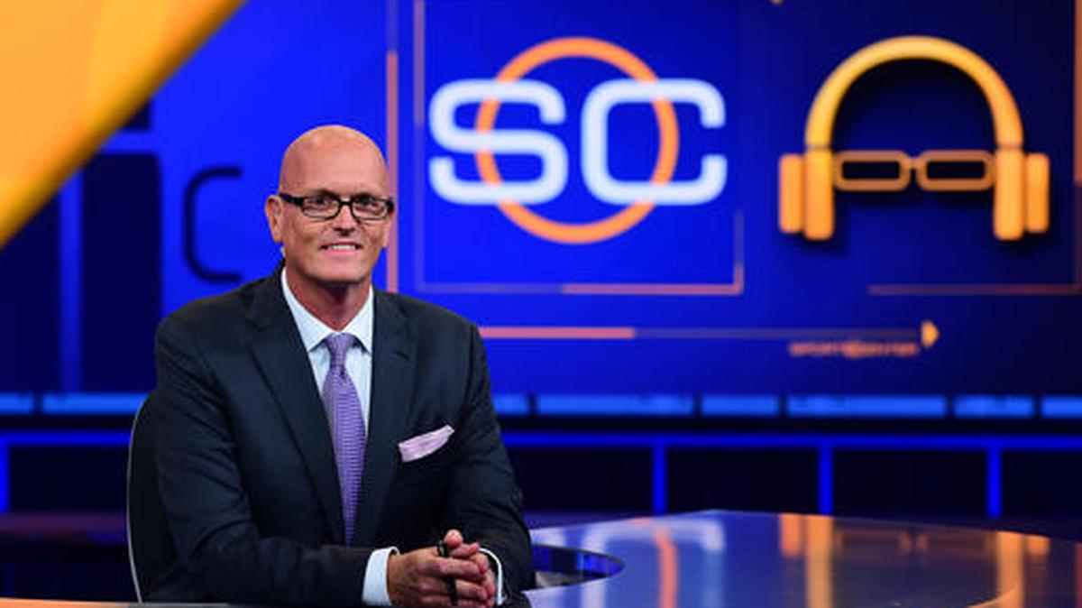 In this Sept. 7, 2015 photo released by ESPN, Scott Van Pelt appears on the set of “SportsCenter” in Bristol, Conn. To a certain segment of the population, Van Pelt is a more popular late-night television star than Jimmy Fallon, Jimmy Kimmel and Stephen Colbert. While he doesn’t perform monologue jokes, the midnight show he hosts incorporates elements from the late-night comedy shows, including a greater emphasis on interviews and bite-sized pieces of material that can live online independent of the television show.