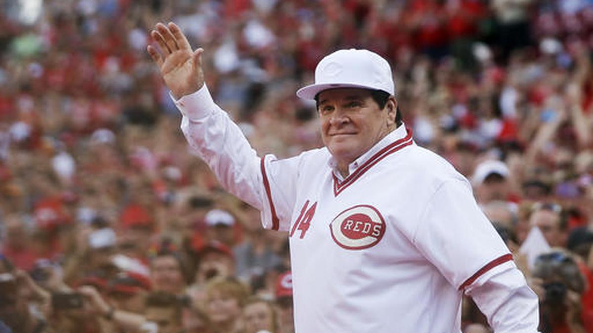 In this June 24, 2016, file photo, former Cincinnati Red Pete Rose waves to the crowd as he is introduced on the field during a ceremony to honor the 1976 World Series champions team, before the Reds' baseball game against the San Diego Padres in Cincinnati.